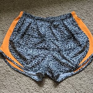 Nike Cheetah Print Mesh Athletic Shorts • M